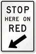 Stop Here On Red Arrow Traffic Sign