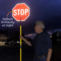 Reflective stop paddle with a post