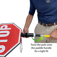 Attach stop paddle to staff