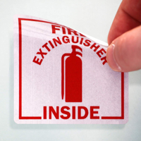 Safety labels for fire suppression equipment