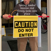 Caution: Do not enter barricade sign