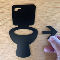 Die-cut restroom sign with adhesive kit