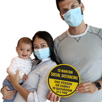 One family in bathroom at a time sign for social distancing