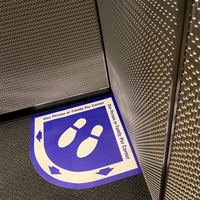 Elevator sign showing where to stand