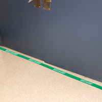 High visibility green safety tape
