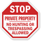STOP: Private Property No Hunting or trespassing sign
