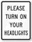 Please Turn On Your Headlights Sign