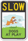 Dogs at Play Slow Down Sign