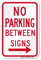 No Parking Between Sign (right arrow)